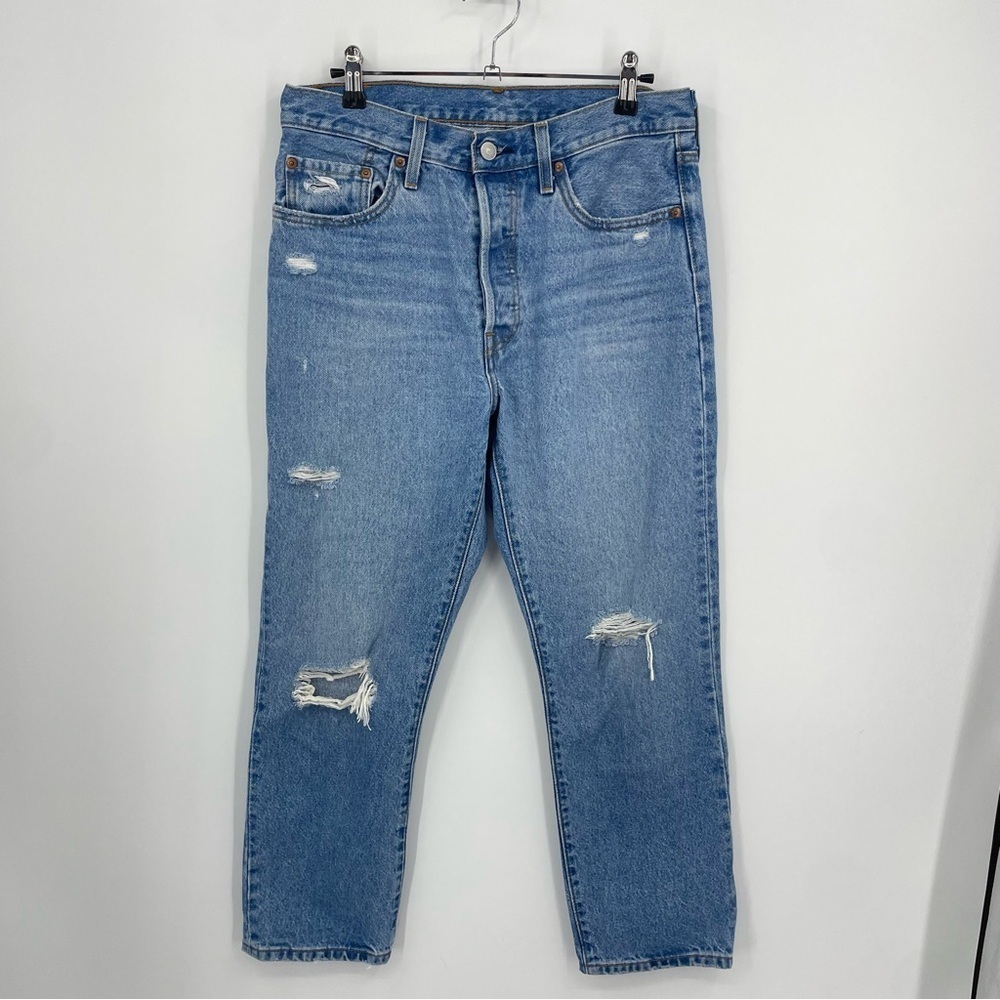 Levi’s premium 501 cropped distressed holes jeans Sz 28‎